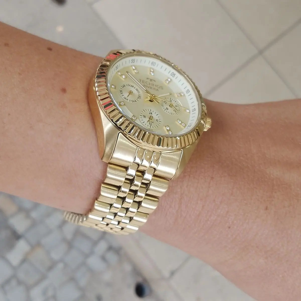 Relogio Technos feminino Riviera dourado grande aço inox multifunção 6P79BW/1X