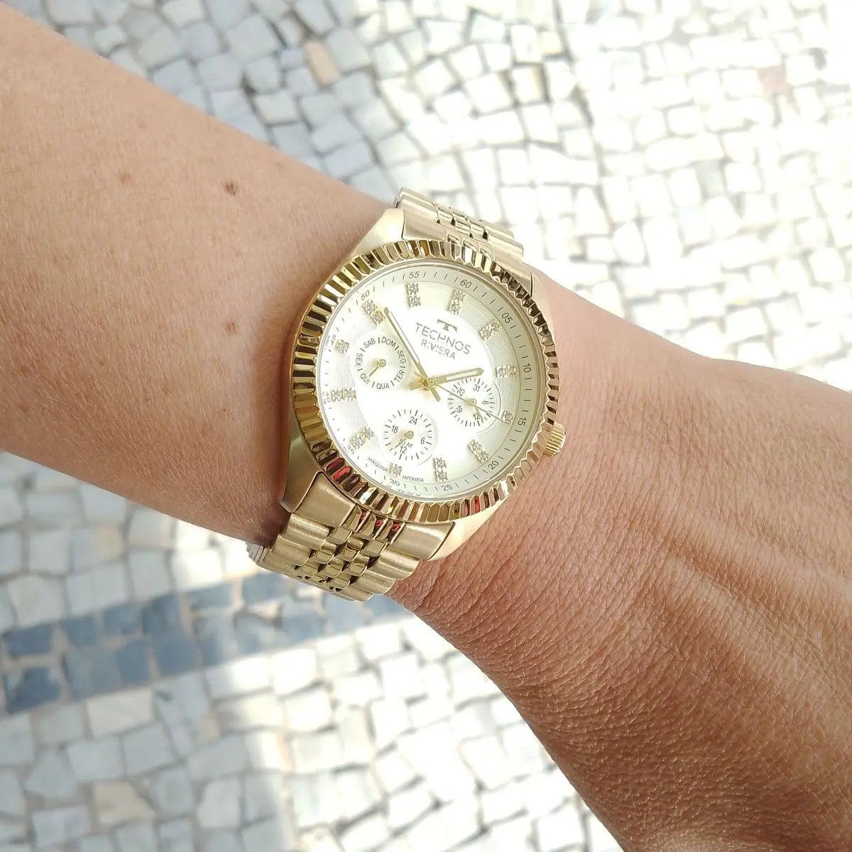 Relogio Technos feminino Riviera dourado grande aço inox multifunção 6P79BW/1X